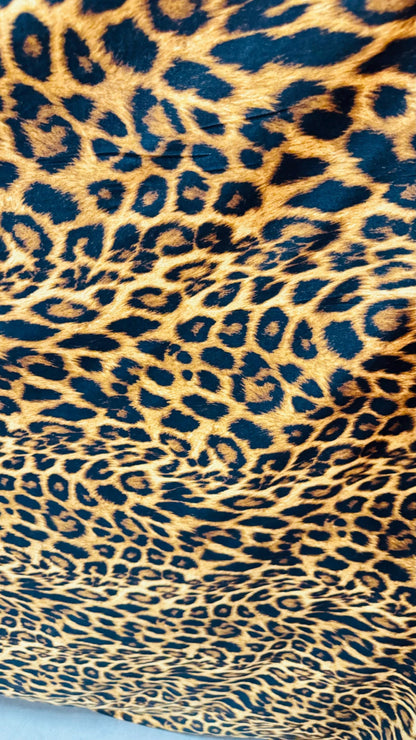 New leopard print Brown/Gold on brush poly spandex 4way stretch 58/60" Sold by the YD. Ships worldwide from Los Ángeles California USA.