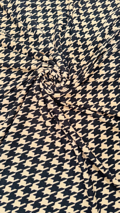 New Modern brand Houndstooth design print on sweater knit 2-way stretch 58/60” Sold by the YD. Ships worldwide from Los Angeles California