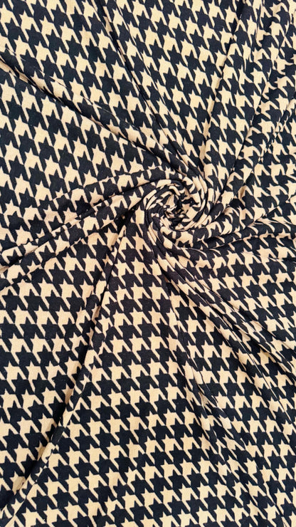 New Modern brand Houndstooth design print on sweater knit 2-way stretch 58/60” Sold by the YD. Ships worldwide from Los Angeles California
