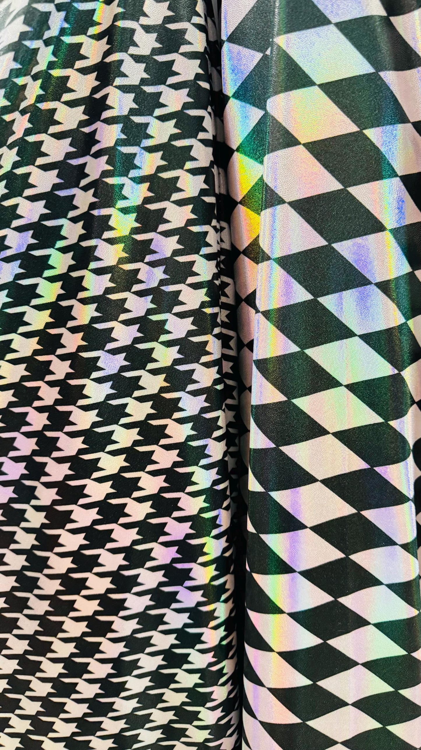 New Diamond and Houndstooth design Iridescent metallic nylon spandex 4way stretch 58/60" Sold by the YD. Ships worldwide from Los Angeles CA