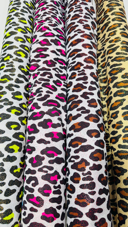 New Exotic Leopard design with hologram foggy foil 4way stretch nylon spandex 58/60" Sold by the YD. Ships worldwide from Los Angeles CA USA
