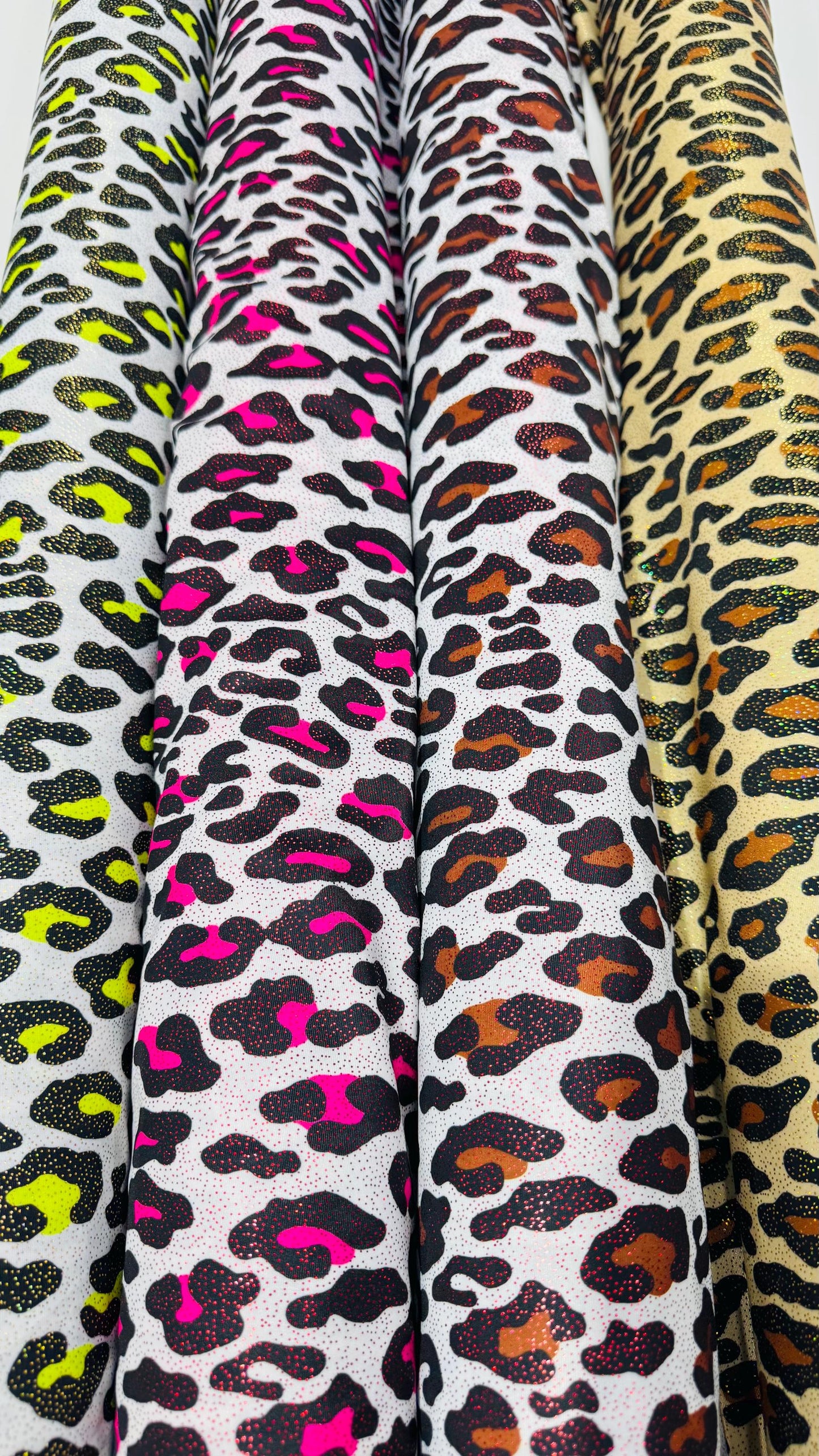 New Exotic Leopard design with hologram foggy foil 4way stretch nylon spandex 58/60" Sold by the YD. Ships worldwide from Los Angeles CA USA