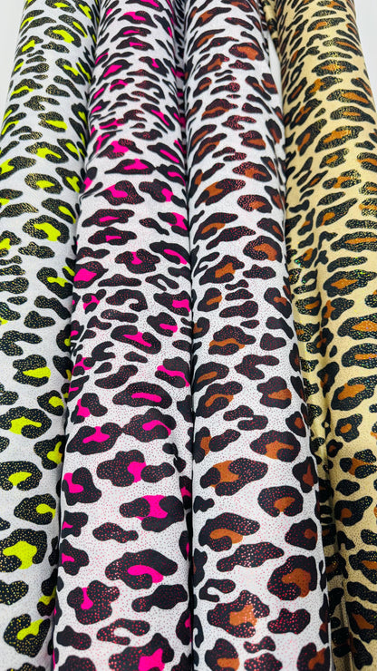 New Exotic Leopard design with hologram foggy foil 4way stretch nylon spandex 58/60" Sold by the YD. Ships worldwide from Los Angeles CA USA