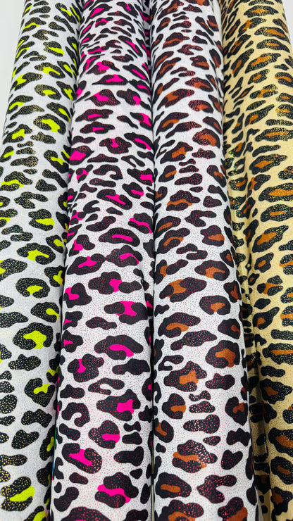 New Exotic Leopard design with hologram foggy foil 4way stretch nylon spandex 58/60" Sold by the YD. Ships worldwide from Los Angeles CA USA