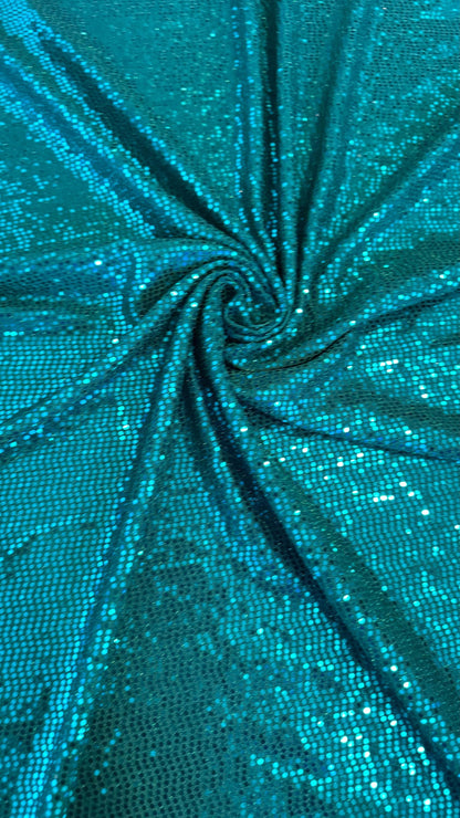 New metallic poly spandex with mini hologram sequins 2-way stretch 58/60” Sold by the YD. Ships worldwide from Los Ángeles California USA.