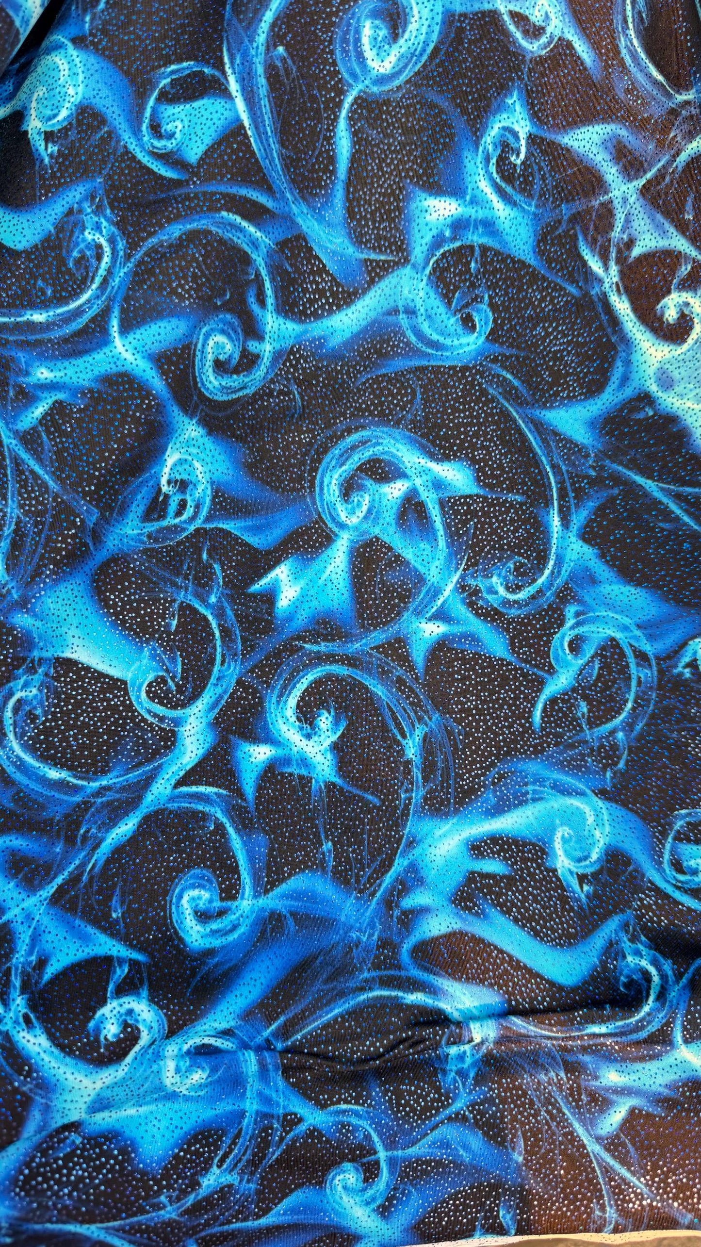 New tornado fire design print on heavy nylon spandex with foggy foil 4way stretch 58/60” Sold by the YD. Ships worldwide from Los Angeles Ca