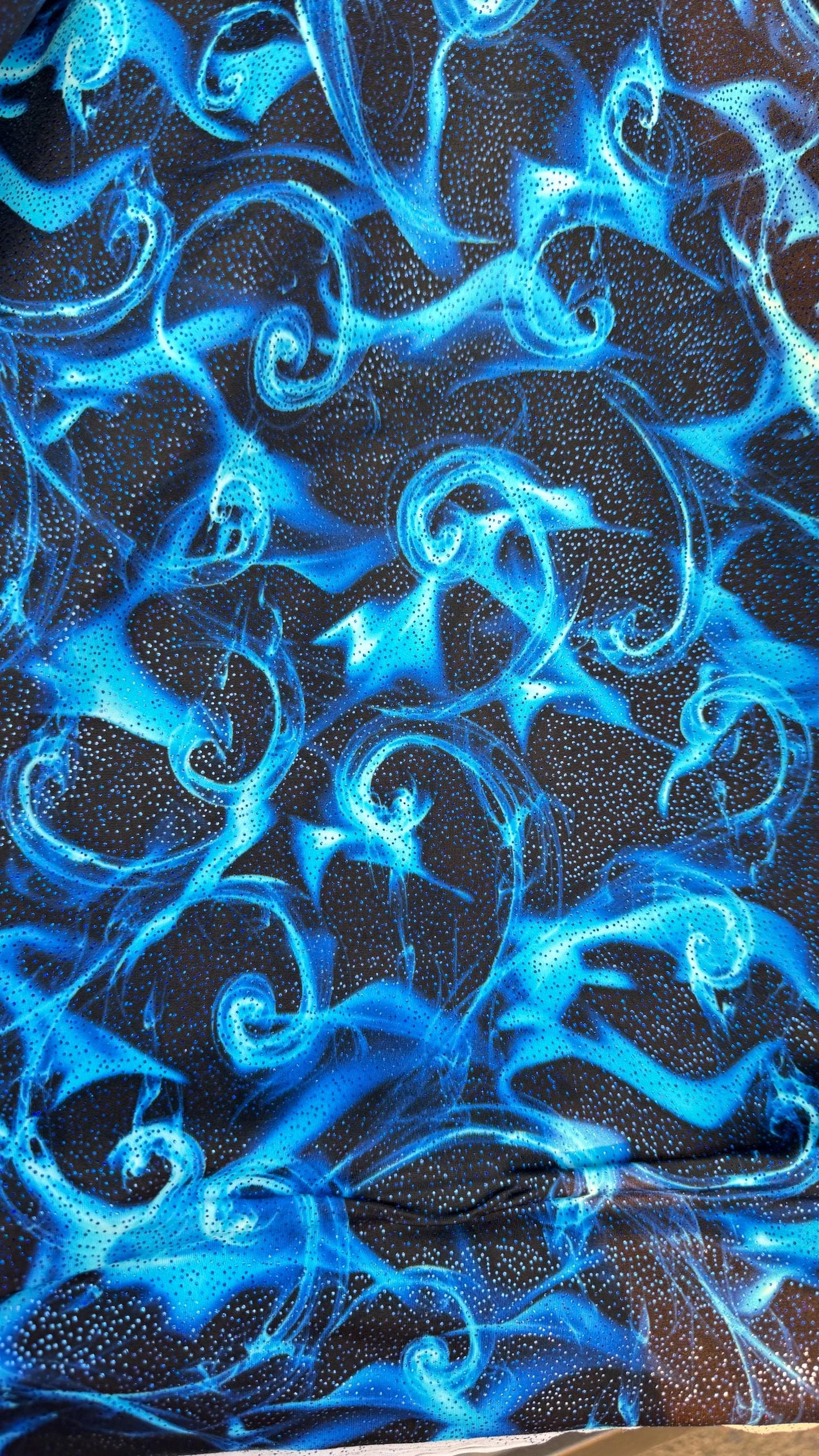 New tornado fire design print on heavy nylon spandex with foggy foil 4way stretch 58/60” Sold by the YD. Ships worldwide from Los Angeles Ca