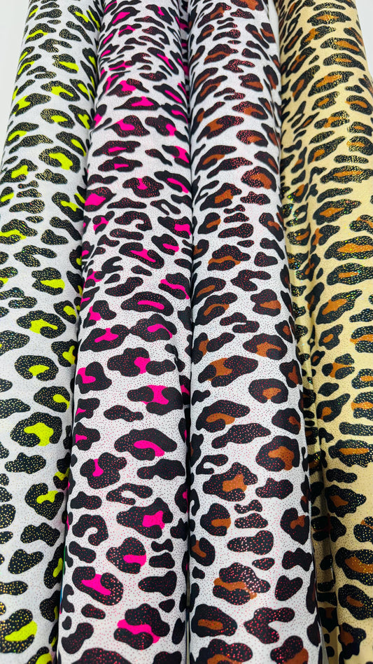New Exotic Leopard design with hologram foggy foil 4way stretch nylon spandex 58/60" Sold by the YD. Ships worldwide from Los Angeles CA USA