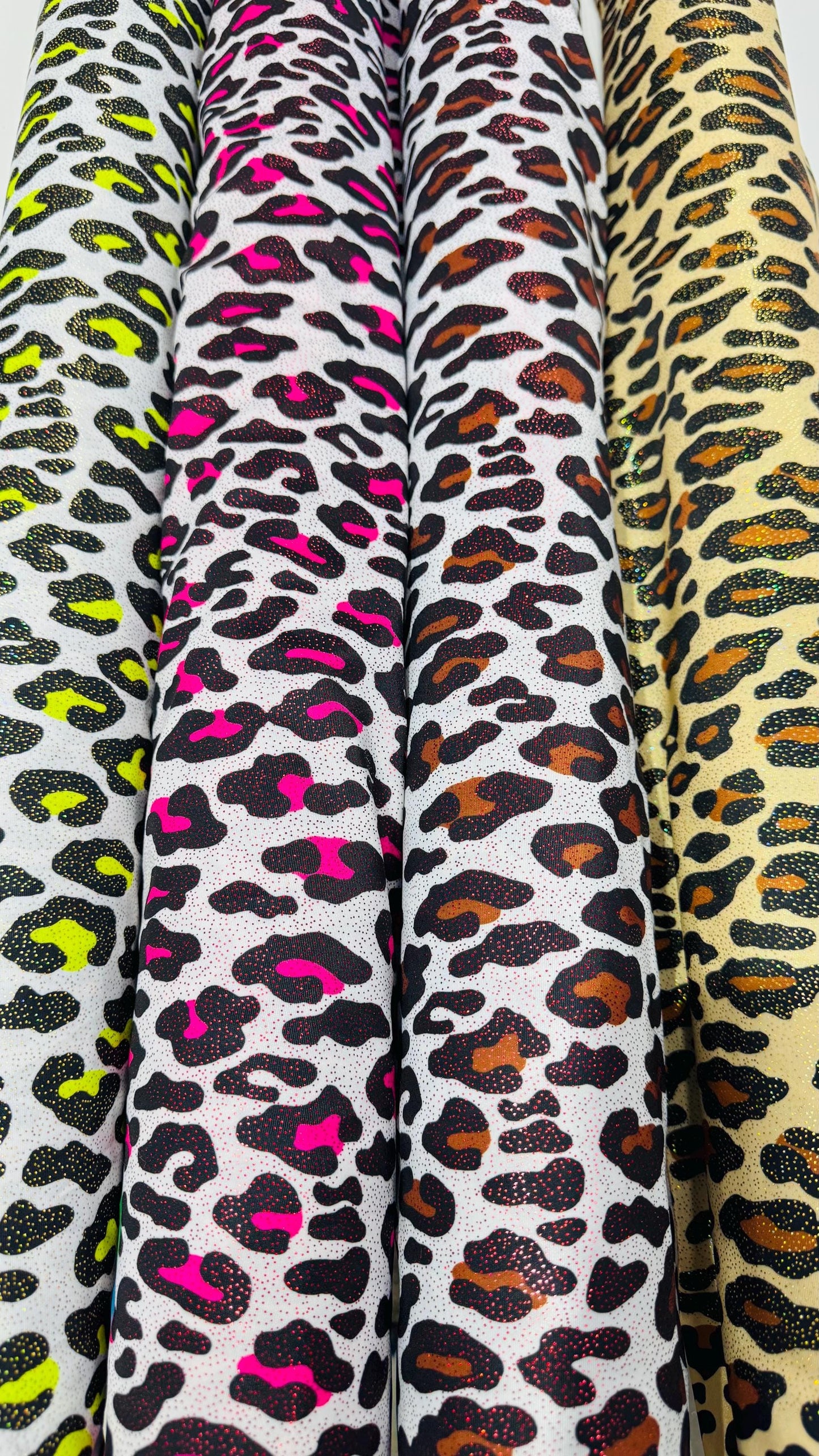 New Exotic Leopard design with hologram foggy foil 4way stretch nylon spandex 58/60" Sold by the YD. Ships worldwide from Los Angeles CA USA