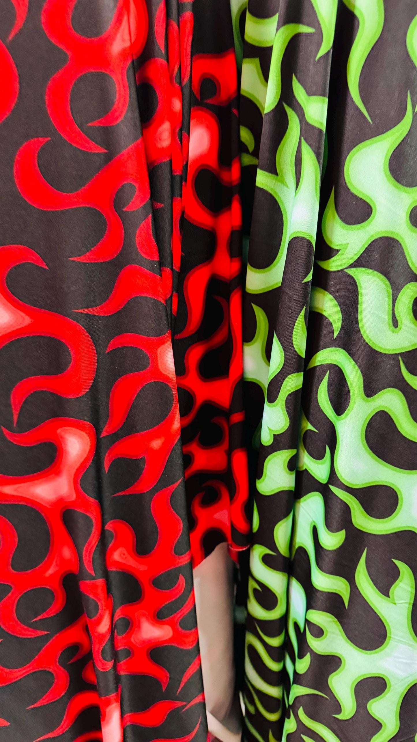 New Flame design Black/Red and Black/Green  color print on nylon spandex 4-way stretch 58/60” Sold by the Yd. High quality fabrics by AlexLA