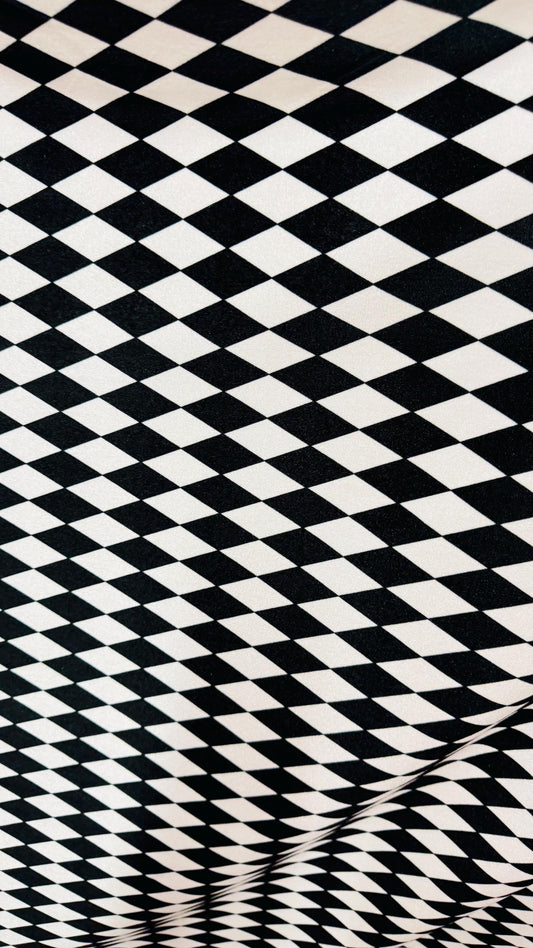 Harlequin design black/white on spandex velvet 4way Stretch 58/60" Sold bubthe YD. Ships worldwide from Los Angeles California USA