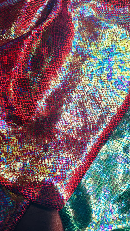 Dragón scales design super shiny iridescent stretch velvet with hologram foil 4-way stretch 58/60” Sold by the YD. Ships Worldwide from L.A