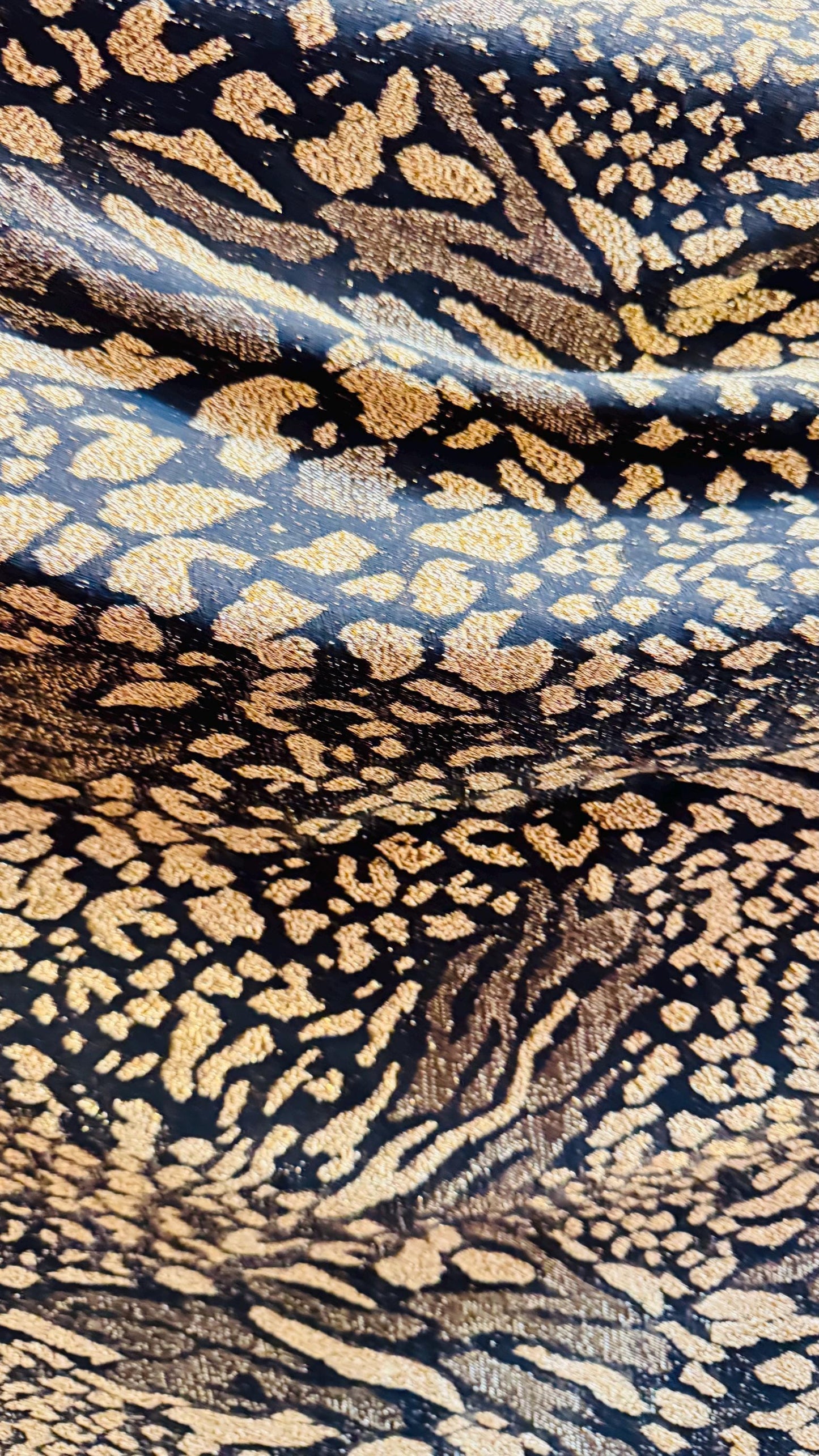 New Exotic Animal design Metallic slinky spandex 4way stretch 58/60" Sold by the YD. Ships worldwide from Los Angeles California USA.