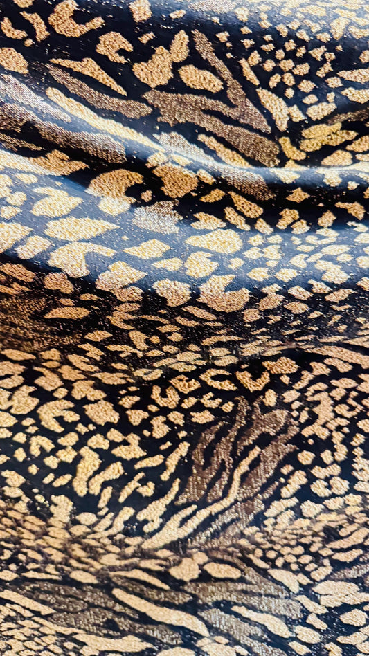 New Exotic Animal design Metallic slinky spandex 4way stretch 58/60" Sold by the YD. Ships worldwide from Los Angeles California USA.
