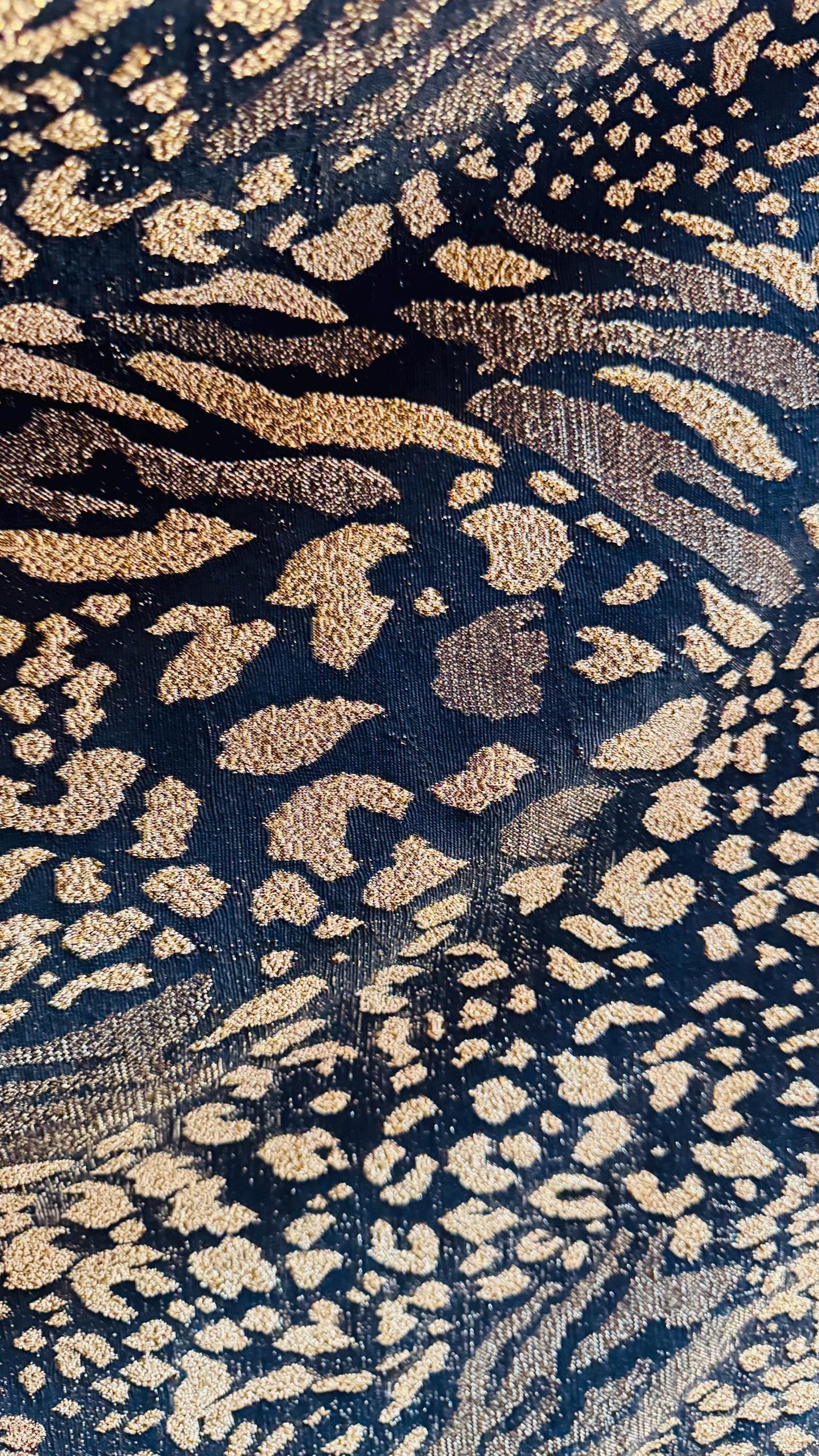 New Exotic Animal design Metallic slinky spandex 4way stretch 58/60" Sold by the YD. Ships worldwide from Los Angeles California USA.