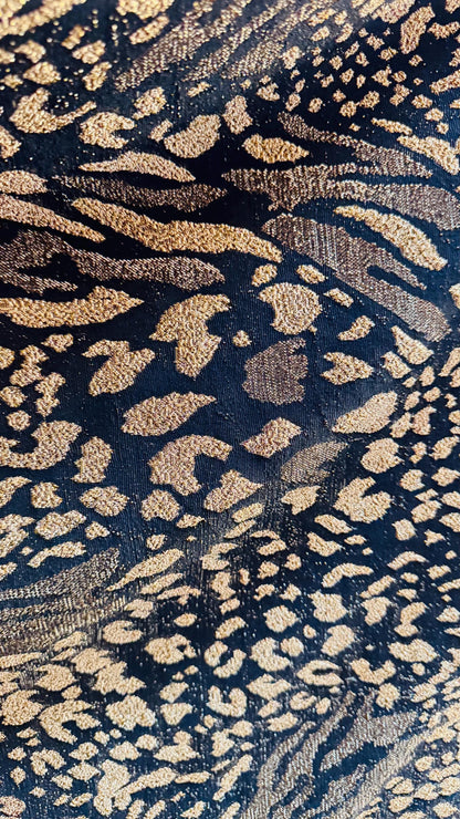 New Exotic Animal design Metallic slinky spandex 4way stretch 58/60" Sold by the YD. Ships worldwide from Los Angeles California USA.