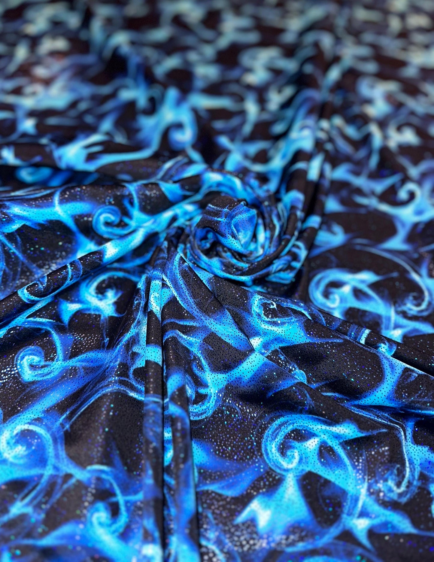 New tornado fire design print on heavy nylon spandex with foggy foil 4way stretch 58/60” Sold by the YD. Ships worldwide from Los Angeles Ca