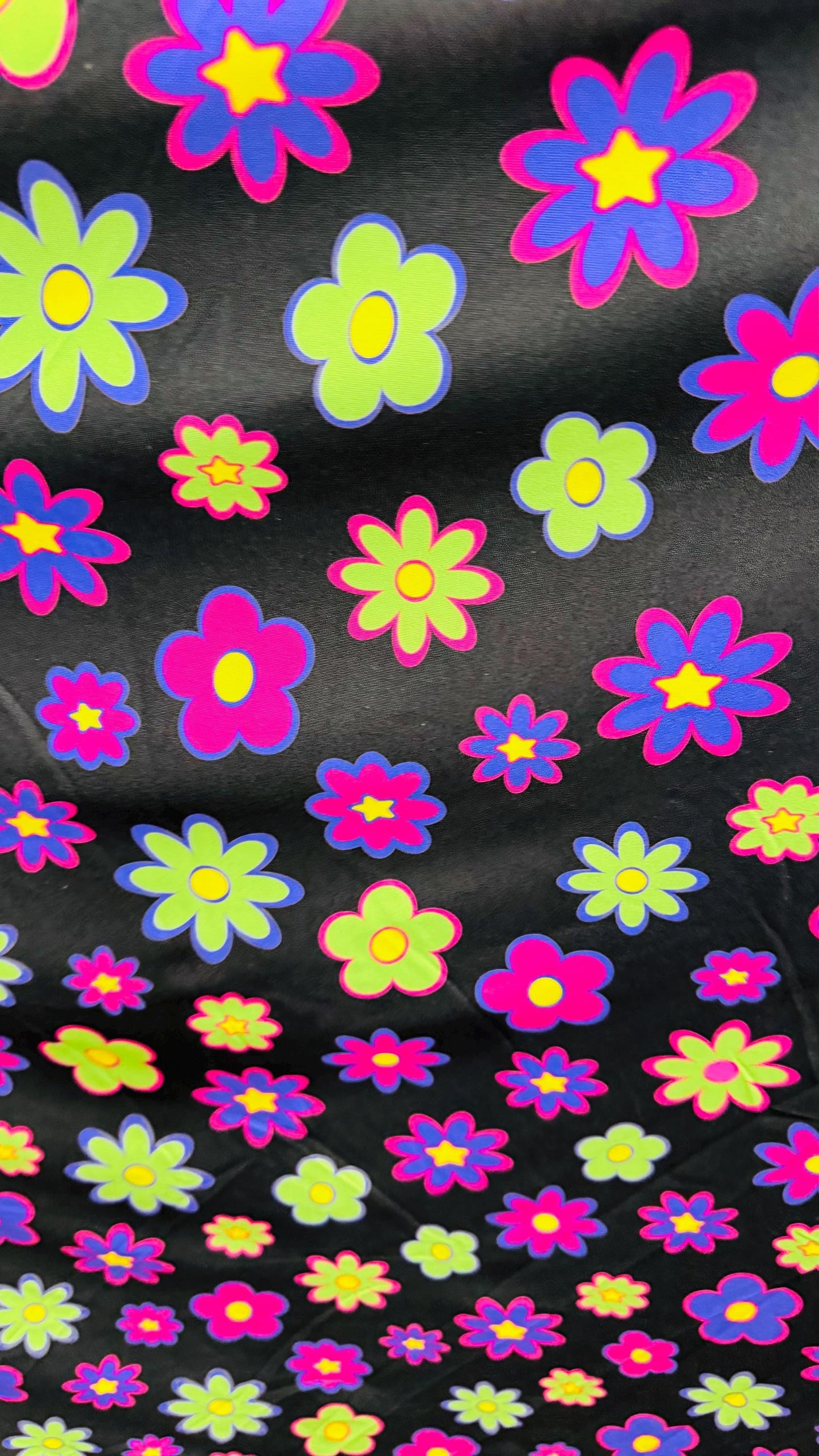 New Daisy Romantic flower design Black/Multicolor print on great quality of nylon spandex 4-way stretch 58/60” Sold by the YD.