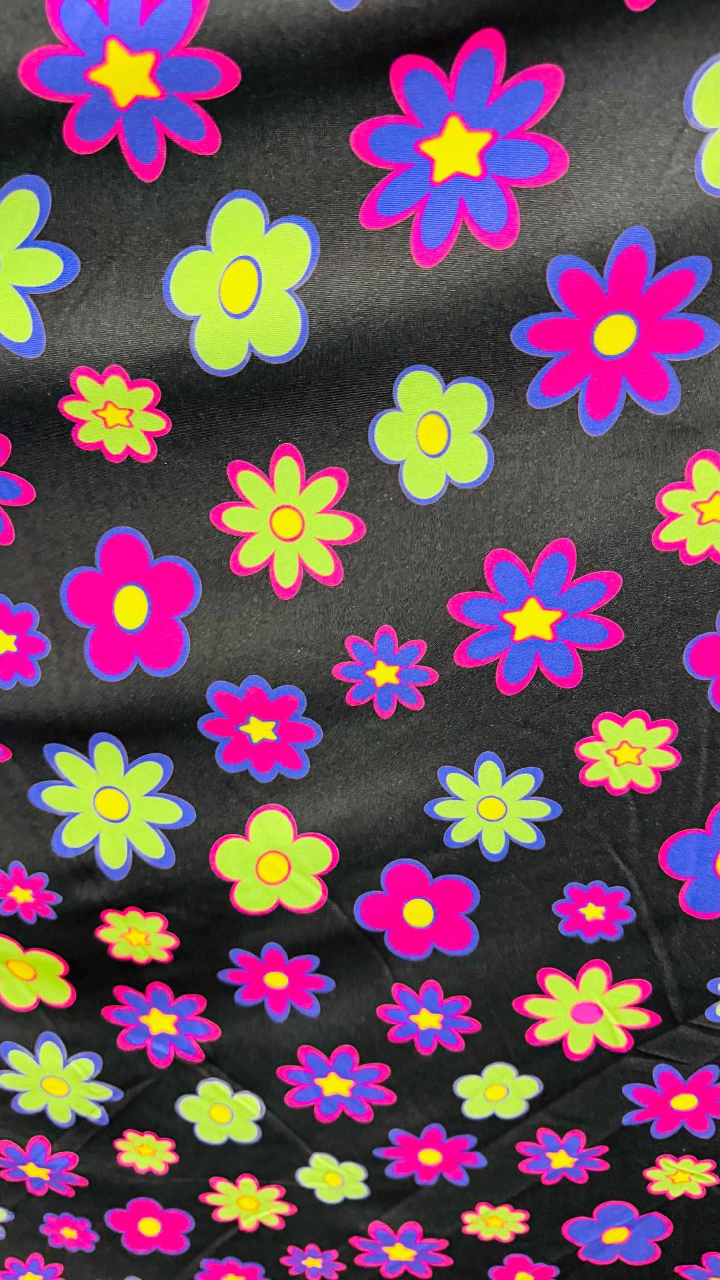 New Daisy Romantic flower design Black/Multicolor print on great quality of nylon spandex 4-way stretch 58/60” Sold by the YD.