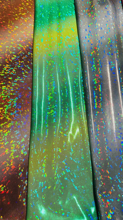 New Ombre design on shattered glass metallic nylon spandex 4-way stretch 58/60” Sold by the YD. Ships worldwide from Los Angeles California