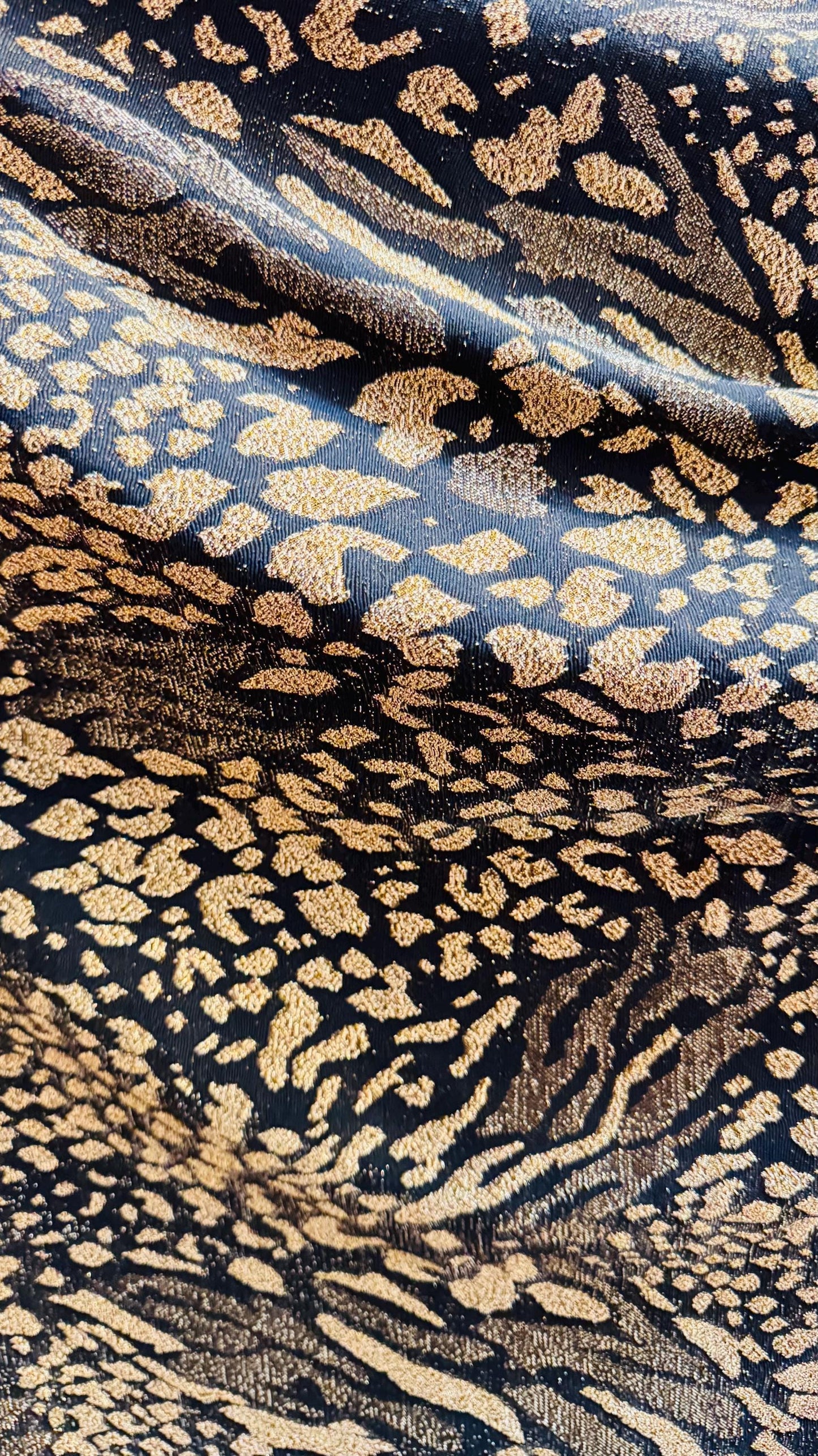 New Exotic Animal design Metallic slinky spandex 4way stretch 58/60" Sold by the YD. Ships worldwide from Los Angeles California USA.