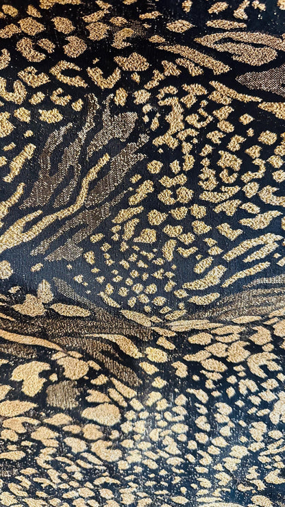 New Exotic Animal design Metallic slinky spandex 4way stretch 58/60" Sold by the YD. Ships worldwide from Los Angeles California USA.