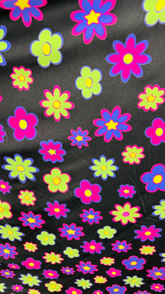 New Daisy Romantic flower design Black/Multicolor print on great quality of nylon spandex 4-way stretch 58/60” Sold by the YD.