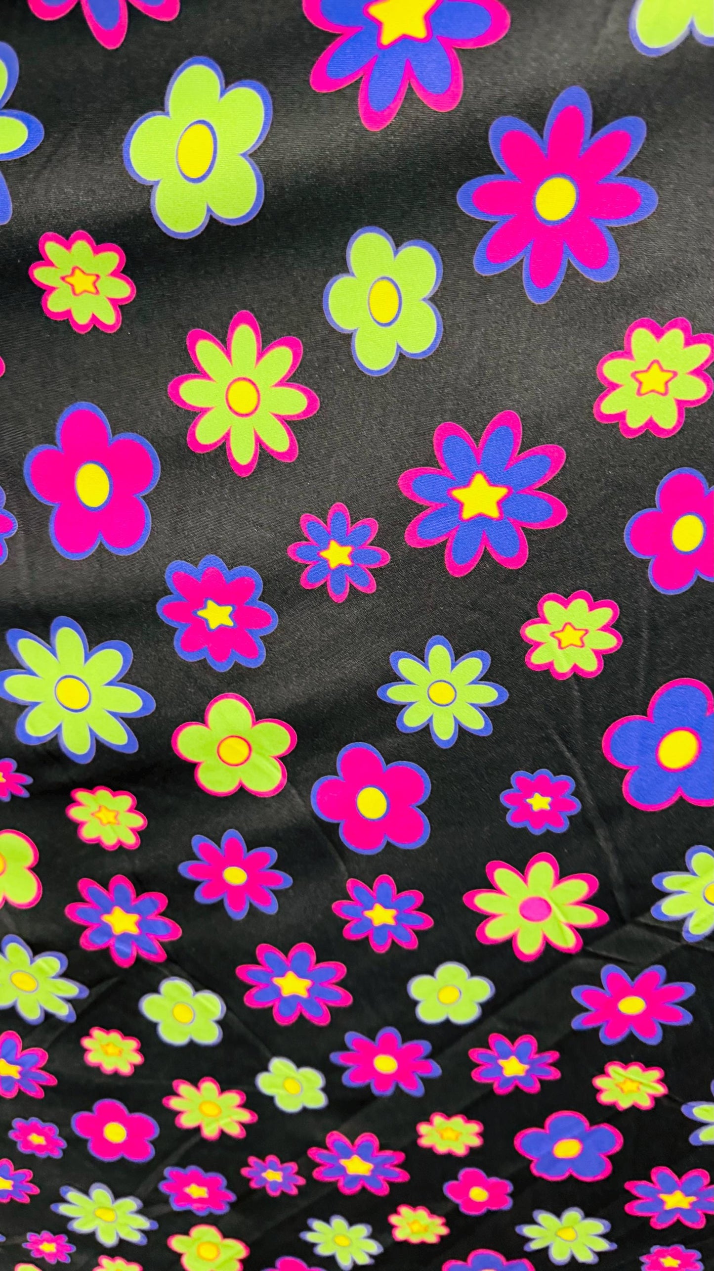 New Daisy Romantic flower design Black/Multicolor print on great quality of nylon spandex 4-way stretch 58/60” Sold by the YD.
