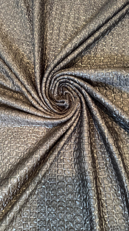 New Exotic Crocodile design embossed on poly spandex 2-way stretch 58/60” Sold by the YD. Ships Worldwide from Los Angeles California USA.