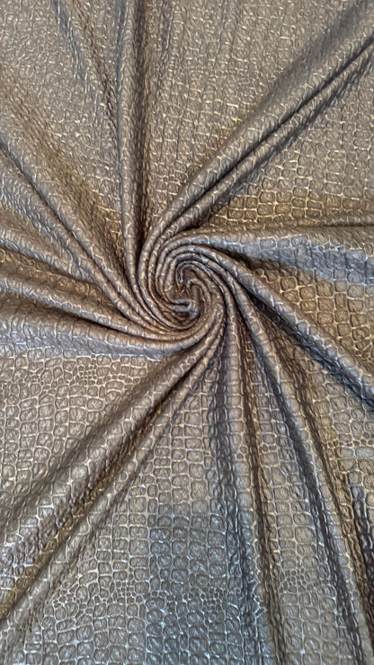 New Exotic Crocodile design embossed on poly spandex 2-way stretch 58/60” Sold by the YD. Ships Worldwide from Los Angeles California USA.