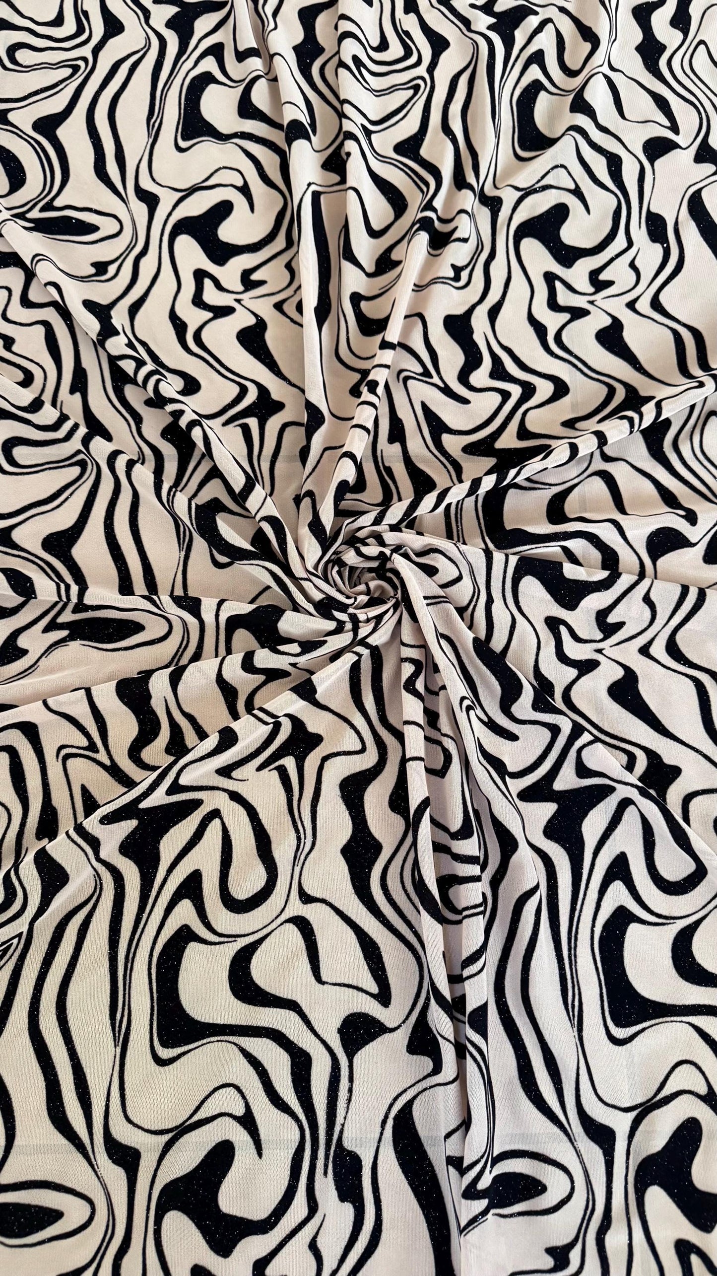 New Abstract design on power mesh With flocking Nude/Black color  4-way stretch 58/60” Sold by the YD. Ships worldwide from Los Angeles CA