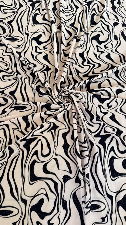 New Abstract design on power mesh With flocking Nude/Black color  4-way stretch 58/60” Sold by the YD. Ships worldwide from Los Angeles CA