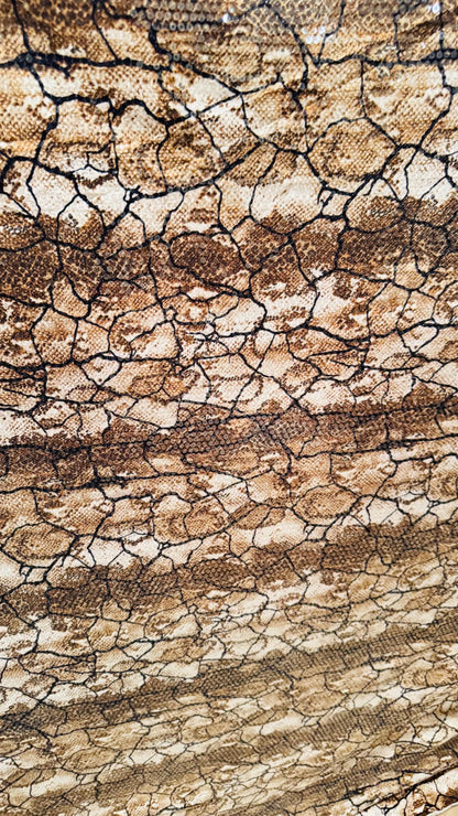 Exotic Snake design Brown/Gold  with clear sequins all over spandex base 4-way  58/60" Sold by the YD. Ships worldwide from Los Ángeles CA