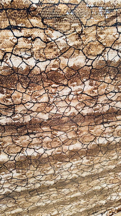Exotic Snake design Brown/Gold  with clear sequins all over spandex base 4-way  58/60" Sold by the YD. Ships worldwide from Los Ángeles CA