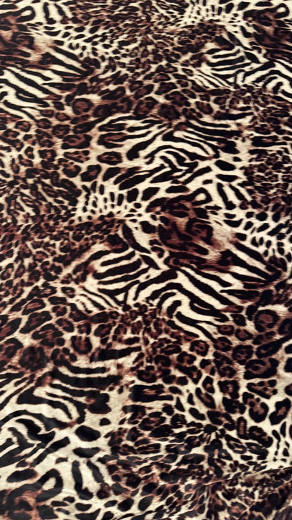 Exotic Animal Safari design on heavy stretch velvet 4way stretch 58/60" Sold by the YD. Ships worldwide from Los Ángeles California USA.
