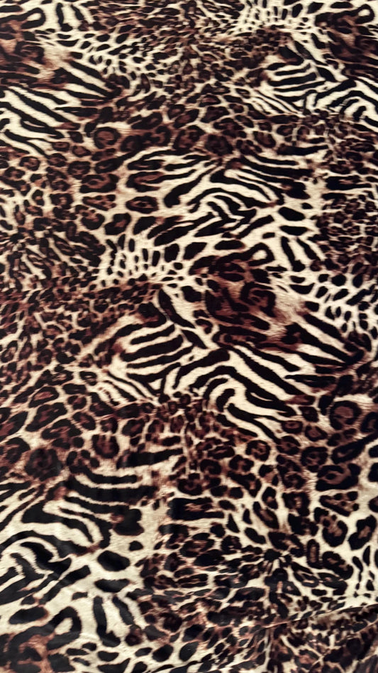 Exotic Animal Safari design on heavy stretch velvet 4way stretch 58/60" Sold by the YD. Ships worldwide from Los Ángeles California USA.