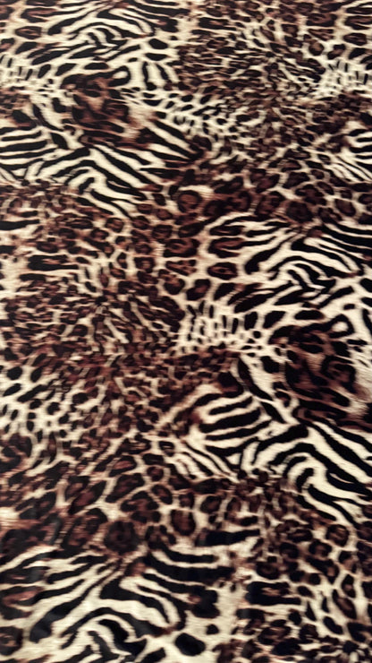 Exotic Animal Safari design on heavy stretch velvet 4way stretch 58/60" Sold by the YD. Ships worldwide from Los Ángeles California USA.