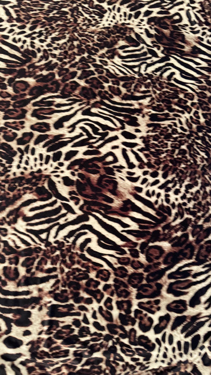 Exotic Animal Safari design on heavy stretch velvet 4way stretch 58/60" Sold by the YD. Ships worldwide from Los Ángeles California USA.