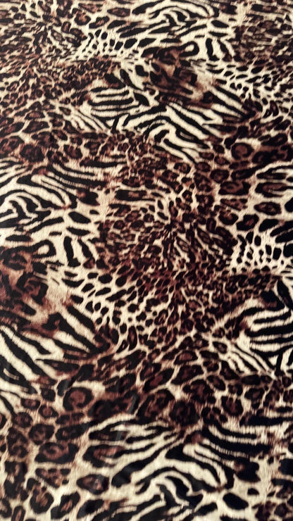 Exotic Animal Safari design on heavy stretch velvet 4way stretch 58/60" Sold by the YD. Ships worldwide from Los Ángeles California USA.