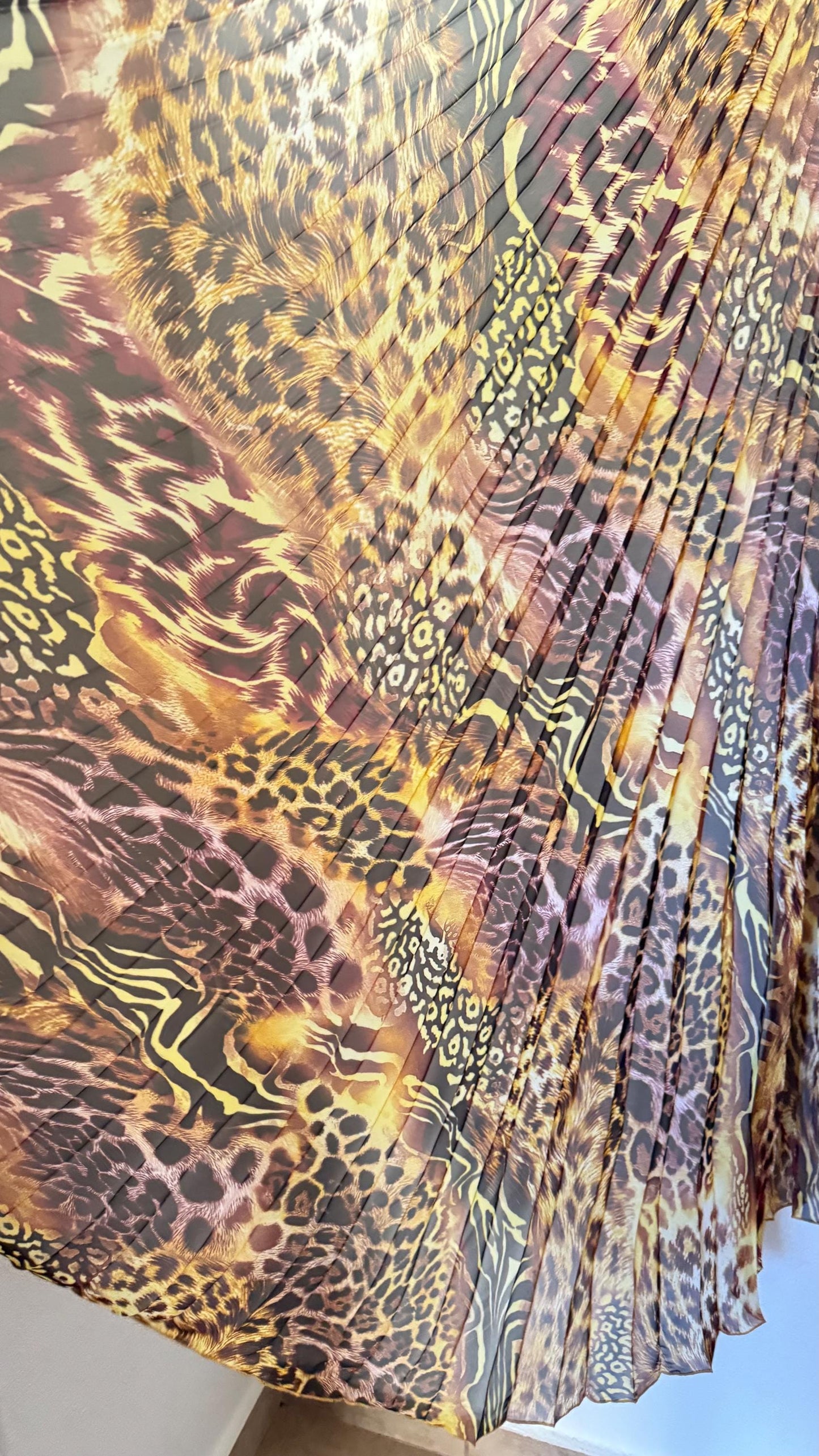 Sunburst pleated Silky Chiffon Safari Design non stretch 108” length by 60” width Sold by the PC. Ships worldwide from Los Angeles CA