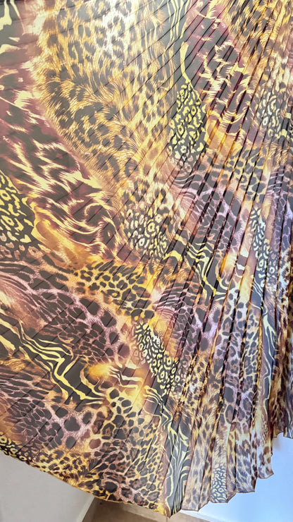 Sunburst pleated Silky Chiffon Safari Design non stretch 108” length by 60” width Sold by the PC. Ships worldwide from Los Angeles CA