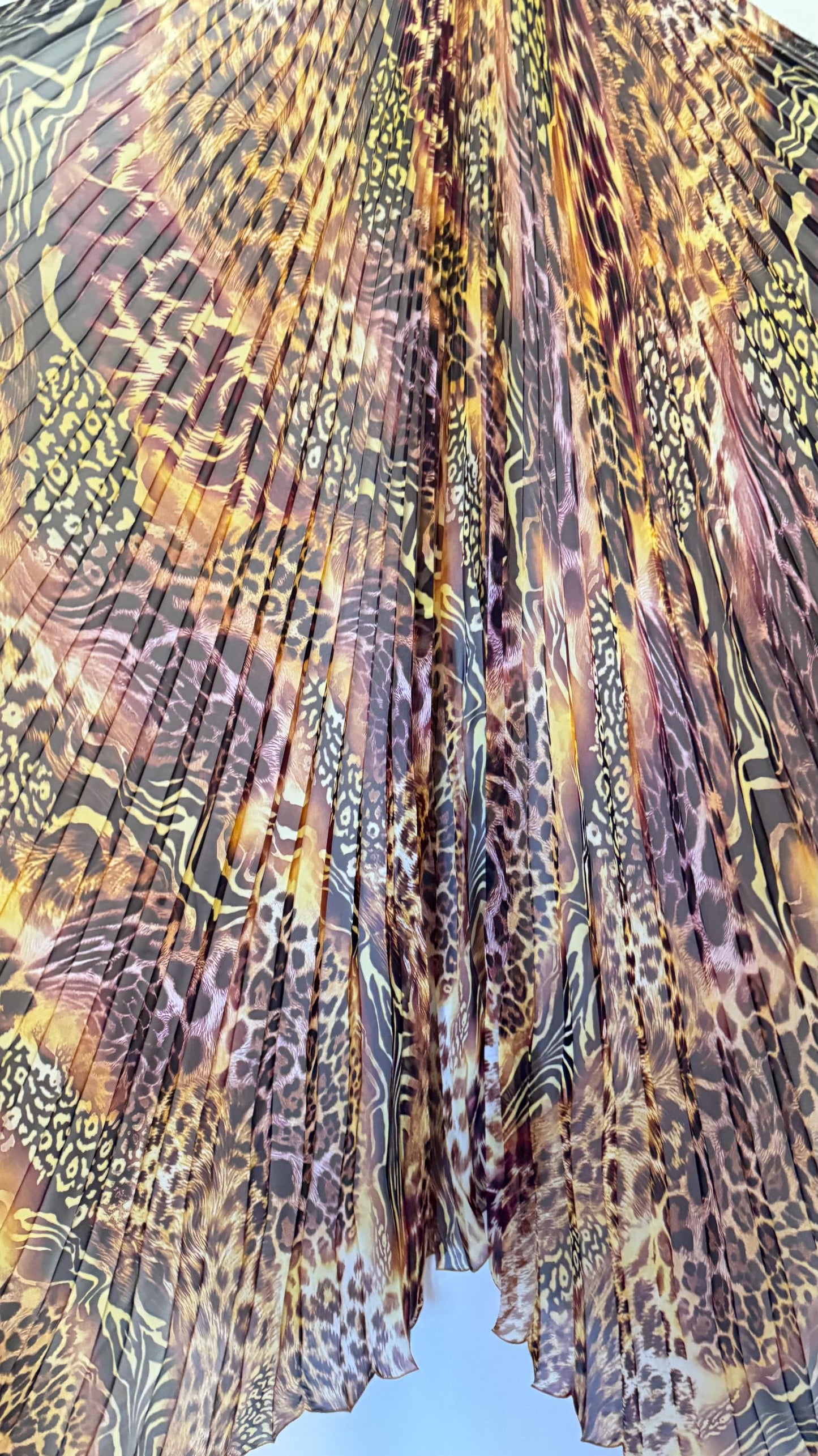 Sunburst pleated Silky Chiffon Safari Design non stretch 190” length by 60” width Sold by the PC. Ships worldwide from Los Angeles CA