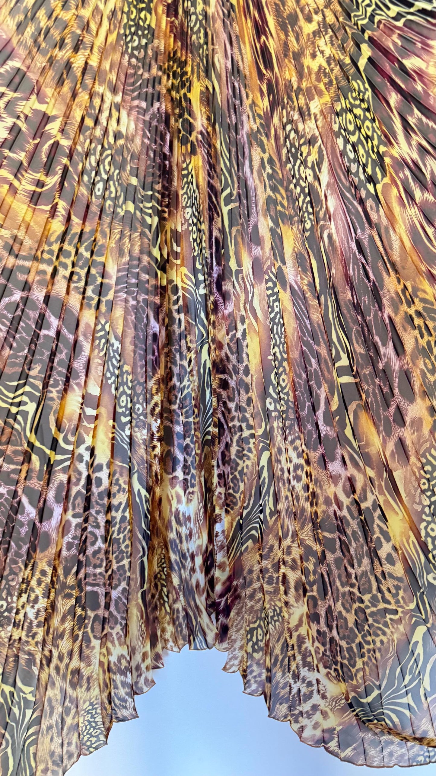 Sunburst pleated Silky Chiffon Safari Design non stretch 190” length by 60” width Sold by the PC. Ships worldwide from Los Angeles CA