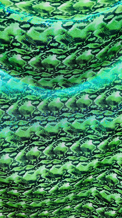 NEW Cobra snake design with hologram ilusión foggy foil all over print on nylon spandex 4way stretch 58/60" Sold by the YD. Ships worldwide