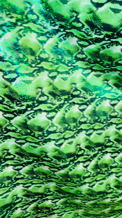 NEW Cobra snake design with hologram ilusión foggy foil all over print on nylon spandex 4way stretch 58/60" Sold by the YD. Ships worldwide
