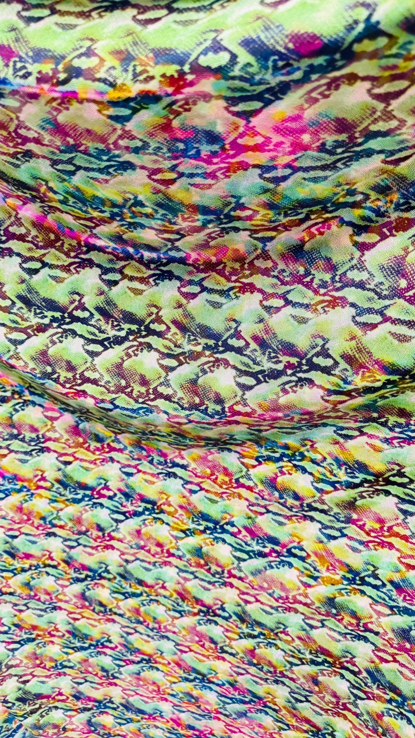 NEW Iridescent Cobra snake design with ilusión foggy foil all over print on metallic nylon spandex 4way stretch 58/60" Sold by the YD.