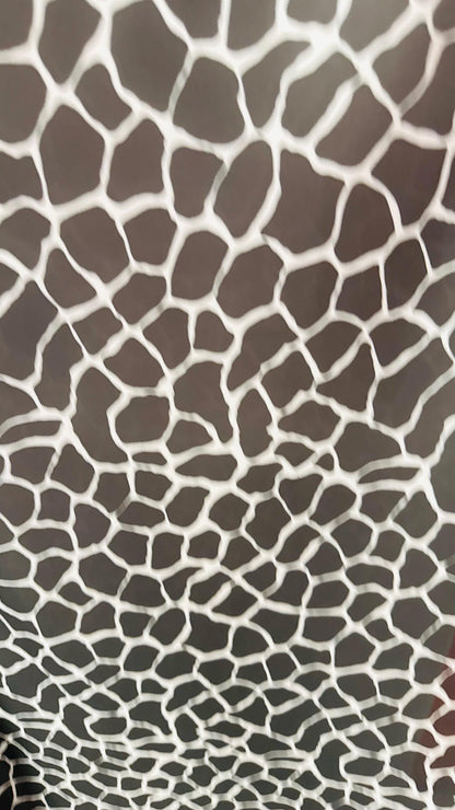 Giraffe design print on power mesh 4-way stretch 58/60” Sold by the YD. Ships Worldwide from Los Angeles California USA.
