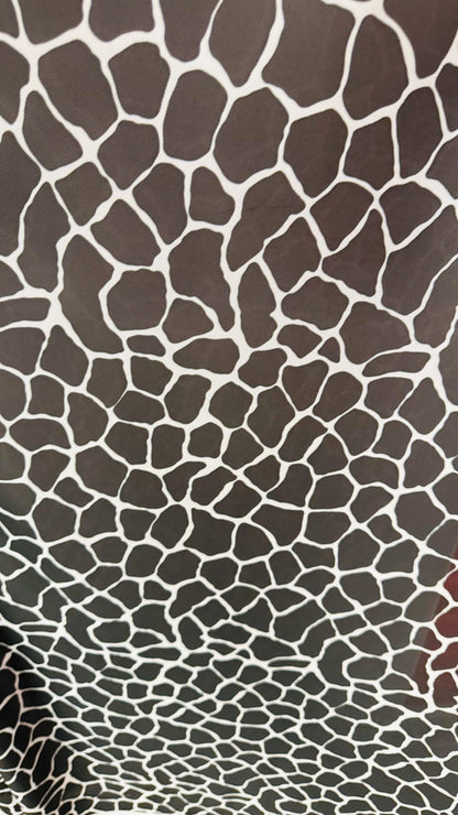 Giraffe design print on power mesh 4-way stretch 58/60” Sold by the YD. Ships Worldwide from Los Angeles California USA.