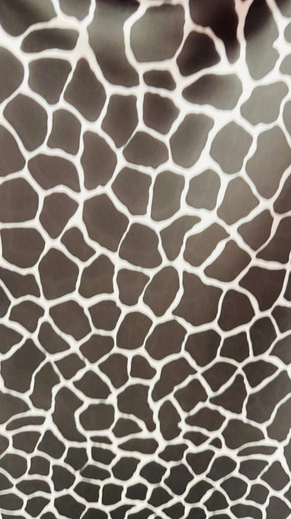 Giraffe design print on power mesh 4-way stretch 58/60” Sold by the YD. Ships Worldwide from Los Angeles California USA.