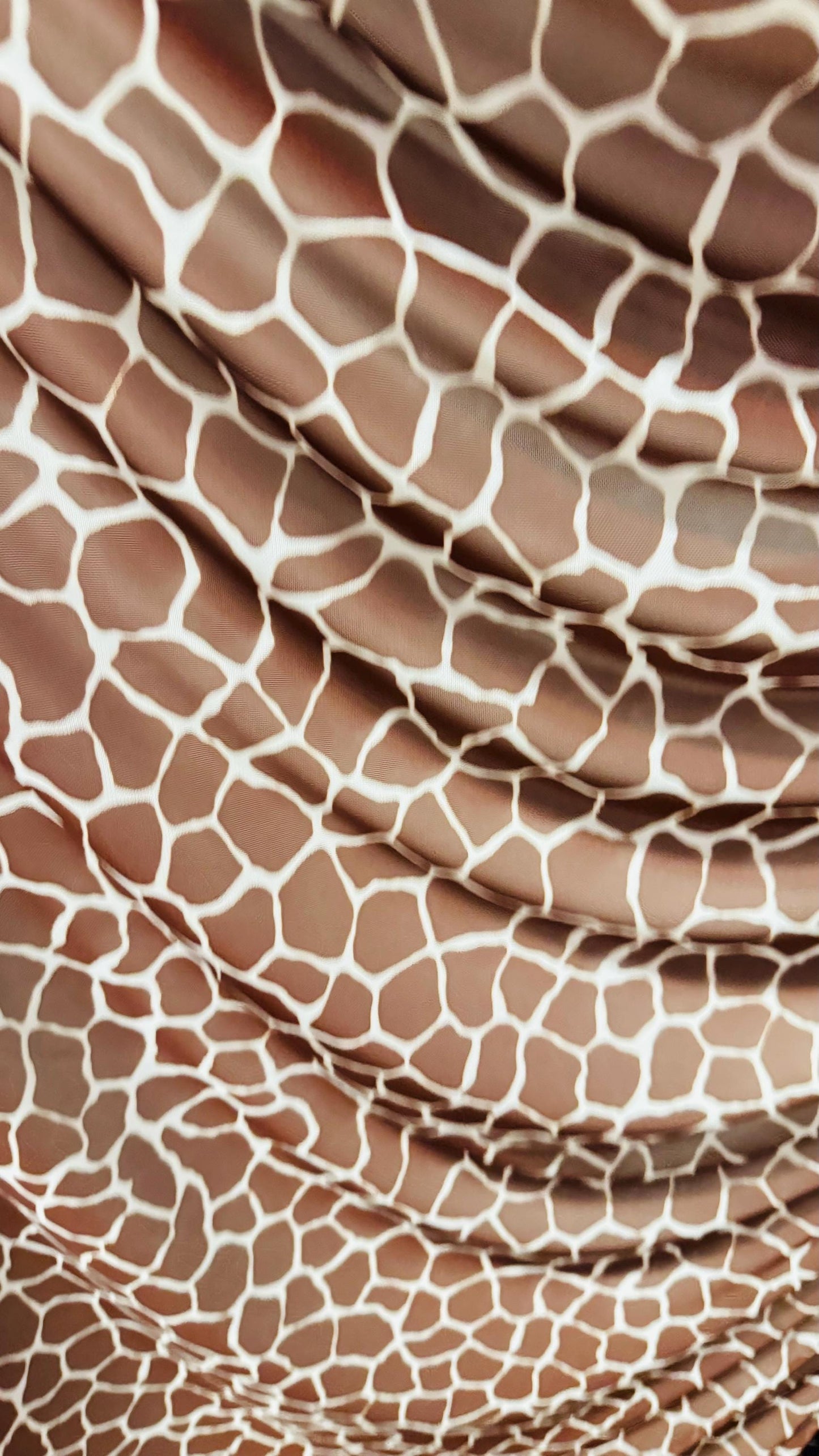 Giraffe design print on power mesh 4-way stretch 58/60” Sold by the YD. Ships Worldwide from Los Angeles California USA.